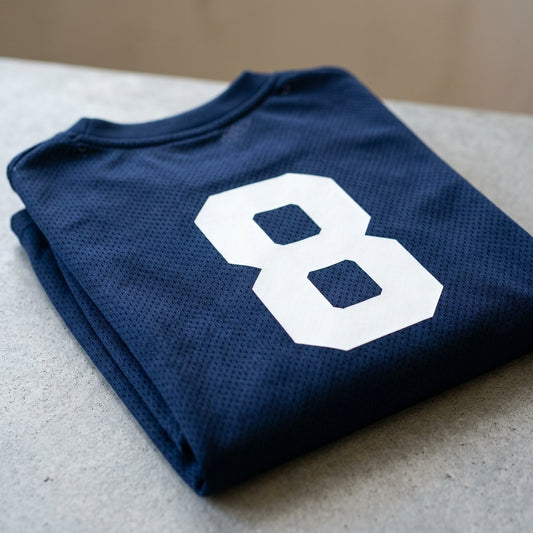 Athletic jersey with crisp heat-transfer-vinyl number